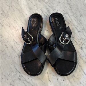 Michael Kors Black Women's Sandals Size 91/2
Silver buckle